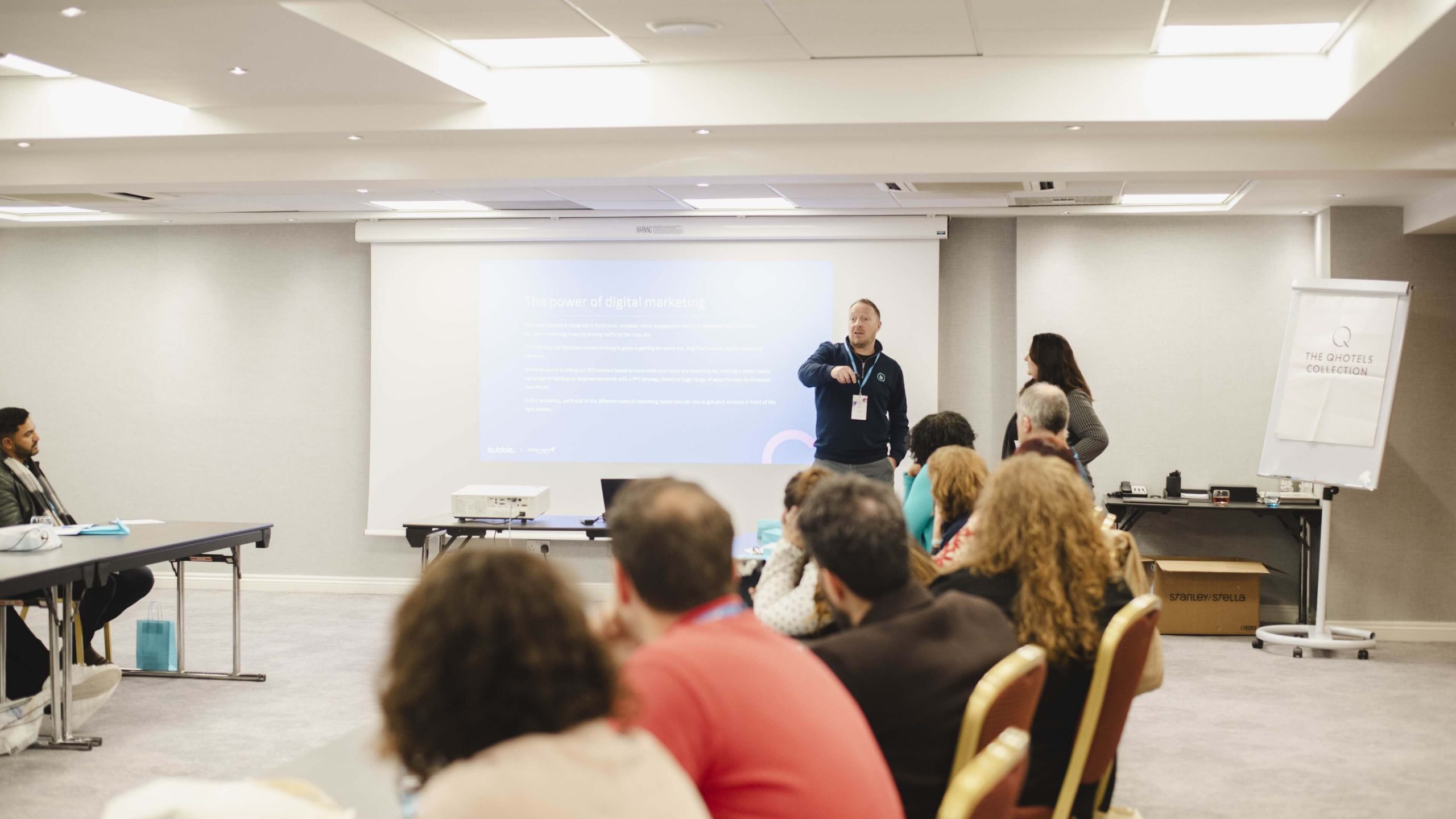Bubble team members Chris and Jess delivering a workshop at the Visiting Angels Conference 2026