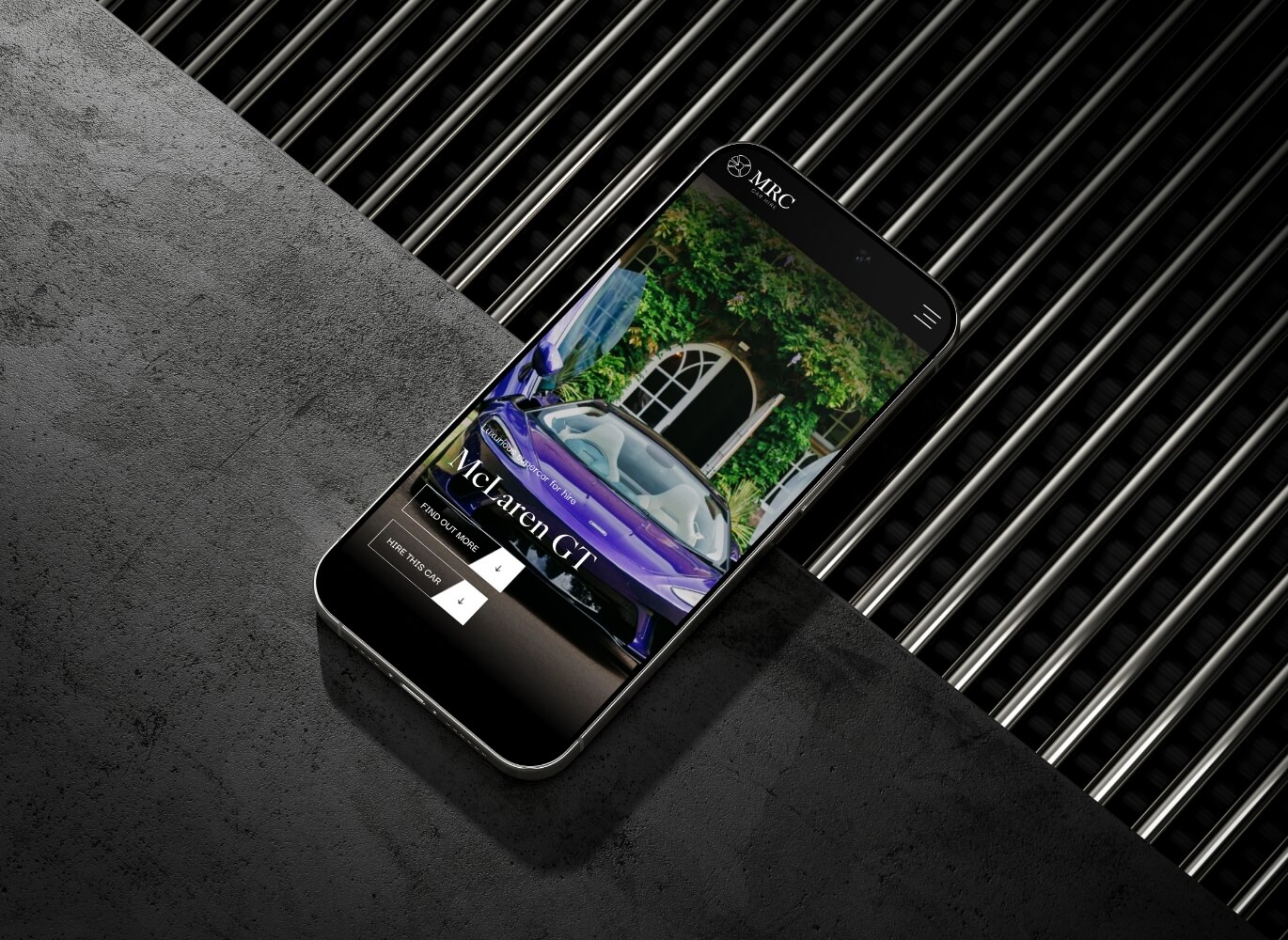 Phone mockup on a black background showing the MRC Hire website